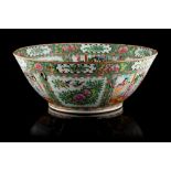 An early 20th century Chinese Canton famille rose medallion bowl, three rim chips with associated