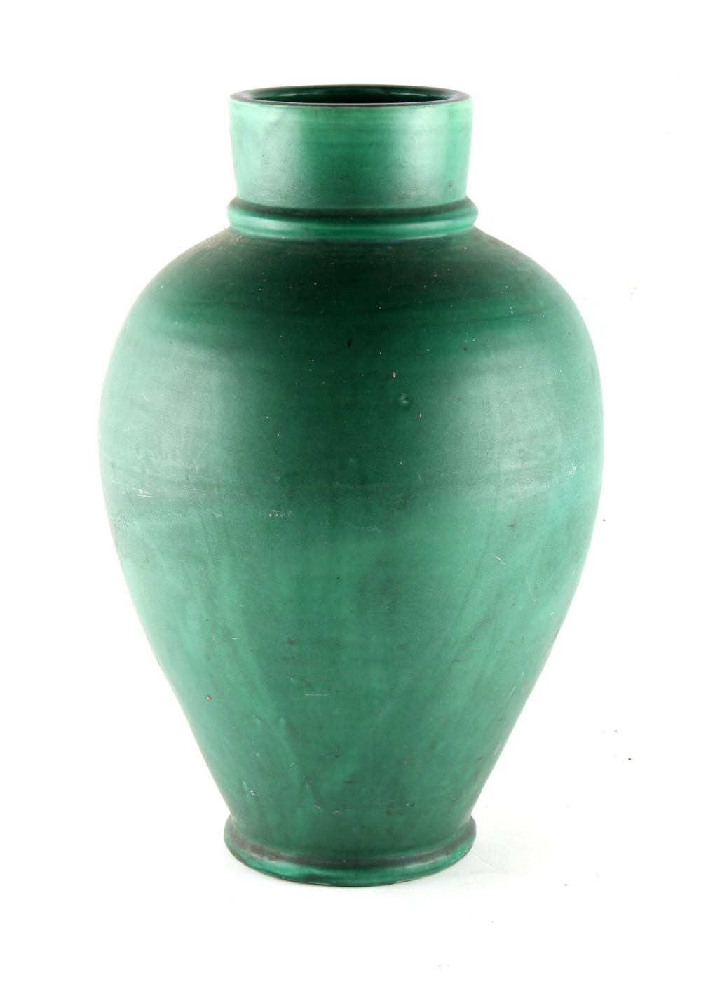 A large C.H. Brannam Barnstaple green glazed pottery baluster vase, 17.7ins. (45cms.) (see