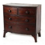 Property of a deceased estate - an early 19th century mahogany bow-fronted chest of two short &