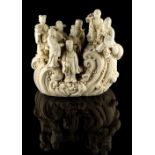 A large Chinese blanc de chine group of the Eight Immortals on waves, 13.2ins. (33.5cms.) high (
