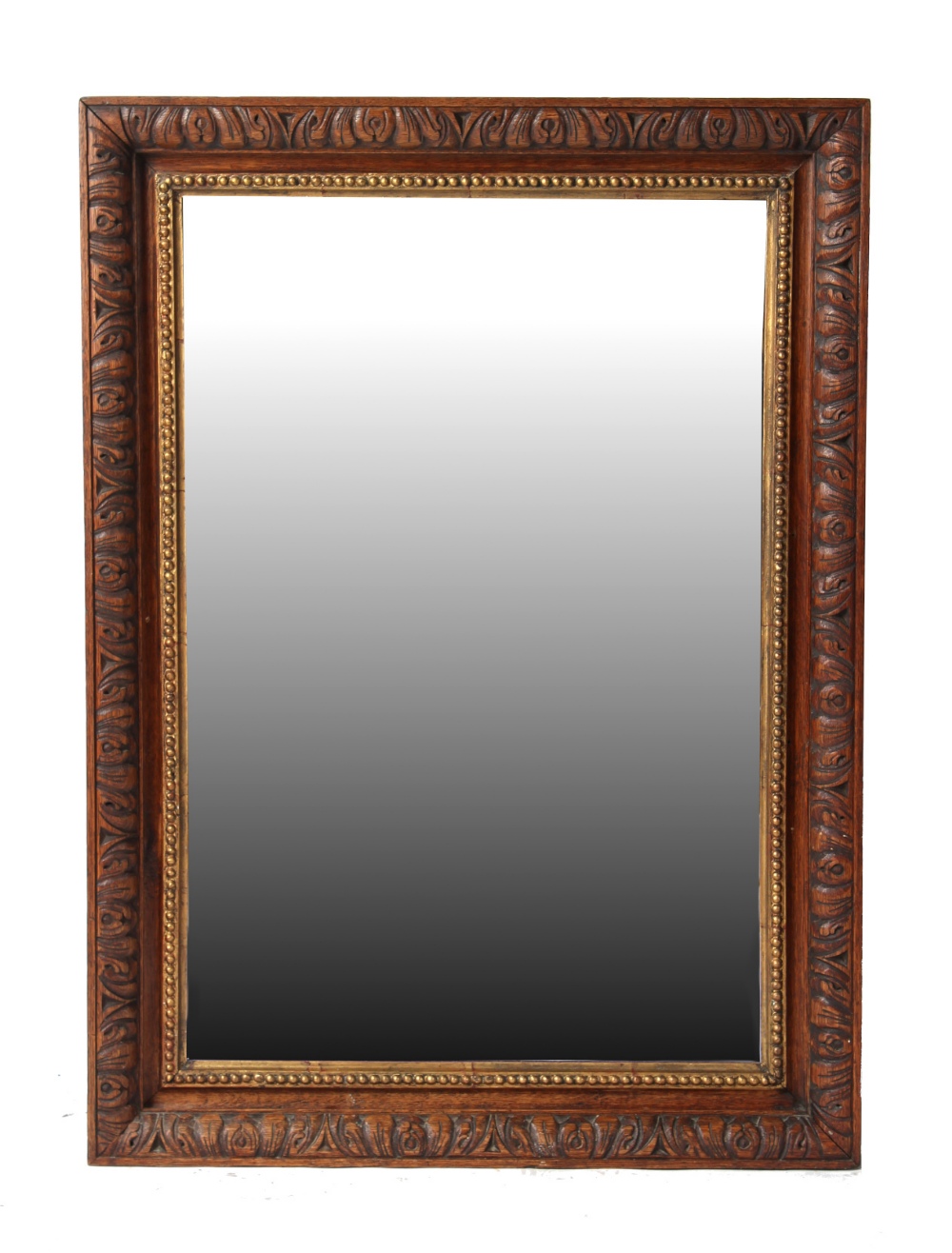 Property of a gentleman - a carved oak rectangular framed wall mirror, 34.85 by 25.3ins. (88.5 by