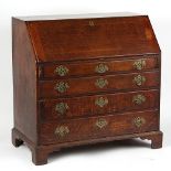 Property of a deceased estate - an 18th century George III oak fall-front bureau, with four long