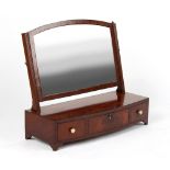 Property of a gentleman - a George III mahogany rectangular swing-frame toilet mirror, with bow-