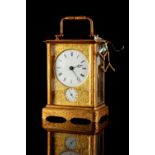 Property of a gentleman - a late 19th century French gilt brass cased carriage clock with alarm &