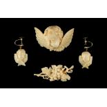 Property of a lady - a late 19th century Continental carved ivory cherub brooch, 2ins. (5cms.) wide;