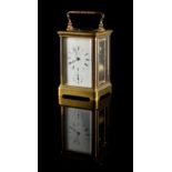 Property of a deceased estate - a late 19th century brass corniche cased alarm carriage clock, the