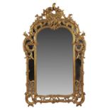 Property of a gentleman - an 18th century style carved giltwood wall mirror, second half 20th