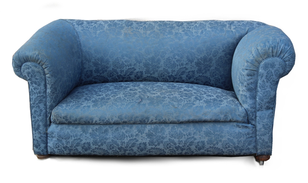 Property of a gentleman - an early 20th century blue floral upholstered drop-end chesterfield