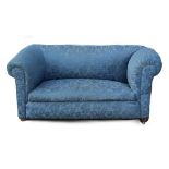 Property of a gentleman - an early 20th century blue floral upholstered drop-end chesterfield