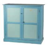 Property of a gentleman - a Victorian blue painted pine two-door cupboard enclosing shelves,