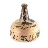 Property of a lady - a late 17th / early 18th century onion shaped wine bottle, with iridescence,