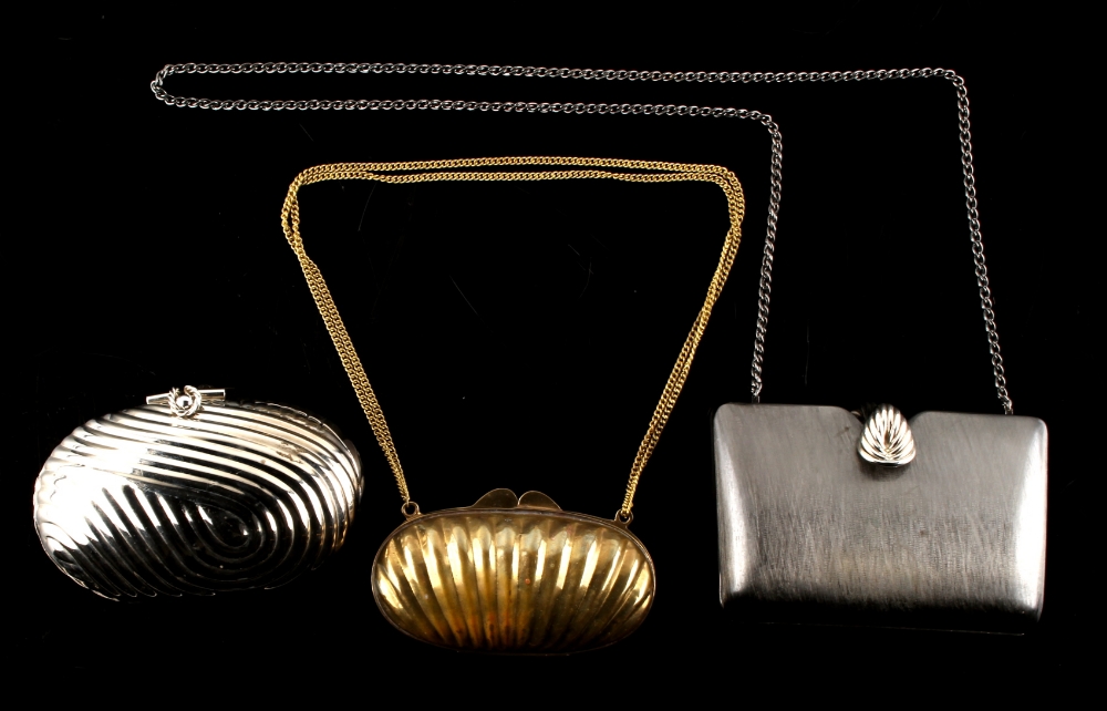 A private collection of handbags from a deceased estate - a yellow metal shell shaped handbag with