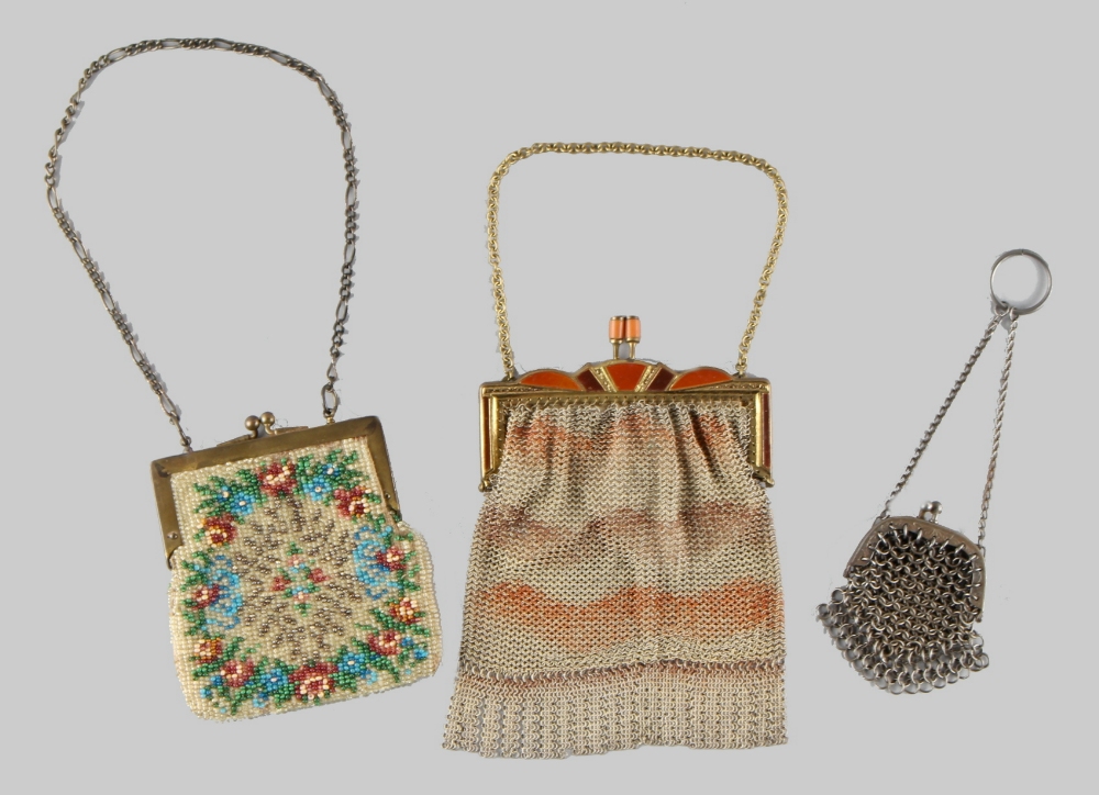 A private collection of handbags from a deceased estate - a vintage yellow metal mesh evening