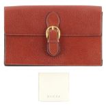 Property of a gentleman - a Gucci tan leather document case, unused, with original Gucci information