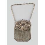 A private collection of handbags from a deceased estate - a white metal chatelaine style mesh purse,