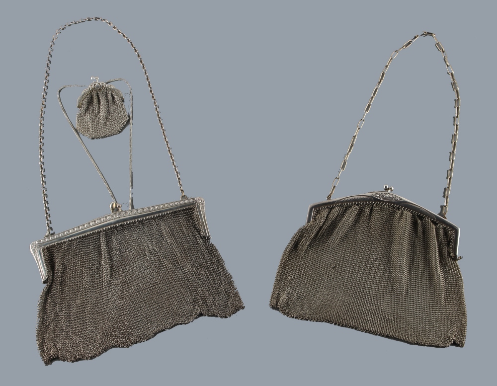 A private collection of handbags from a deceased estate - a silver plated mesh hand bag, the frame