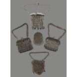 A private collection of handbags from a deceased estate - five assorted white metal mesh purses &