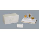 A private collection of perfume bottles - LALIQUE - Les Flacons, The Ultimate Collection, a set of