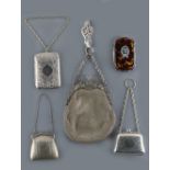 A private collection of handbags from a deceased estate - five early 20th century lady's silver