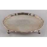 Property of a gentleman - a silver salver or waiter, on hoof feet, with engraved presentation