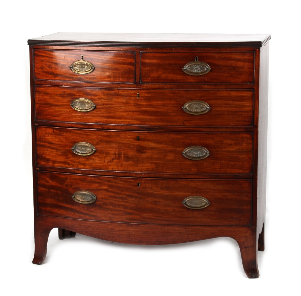 Property of a lady - an early 19th century mahogany bow-fronted chest of two short & three long