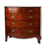 Property of a lady - an early 19th century mahogany bow-fronted chest of two short & three long