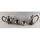 Property of a lady - a late 19th / early 20th century plated four-piece tea-set, with gadrooned rims