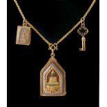 Property of a lady - a Thai yellow gold (tests 24ct) chain necklace with three charms or amulets,