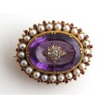 A good unmarked yellow gold amethyst pearl ruby & diamond oval brooch, circa 1830, the oval cut