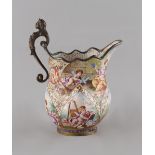 Property of a lady - a 19th century Viennese enamel cream jug, painted with cherubs & other figures,