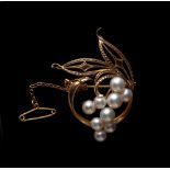 Property of a gentleman - a 14ct yellow gold & pearl floral brooch, 1.65ins. (4.2cms.) across,