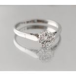 Property of a lady - a platinum diamond solitaire ring, the round brilliant cut diamond