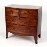 Property of a lady - a small early 19th century mahogany bow-fronted chest of two short & two long