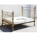 Property of a deceased estate - a Victorian brass 5' double bedstead with large black china