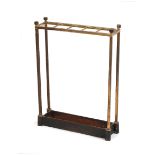 Property of a deceased estate - an Edwardian brass five division stickstand, with cast iron base (