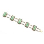 Property of a lady - a Chinese unmarked filigree silver & jadeite rectangular panel bracelet, the