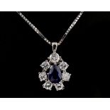 A sapphire & diamond pendant on 9ct white gold chain necklace, the pear shaped sapphire weighing