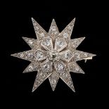 Property of a gentleman - a good large mid 19th century diamond twelve pointed star brooch, with old