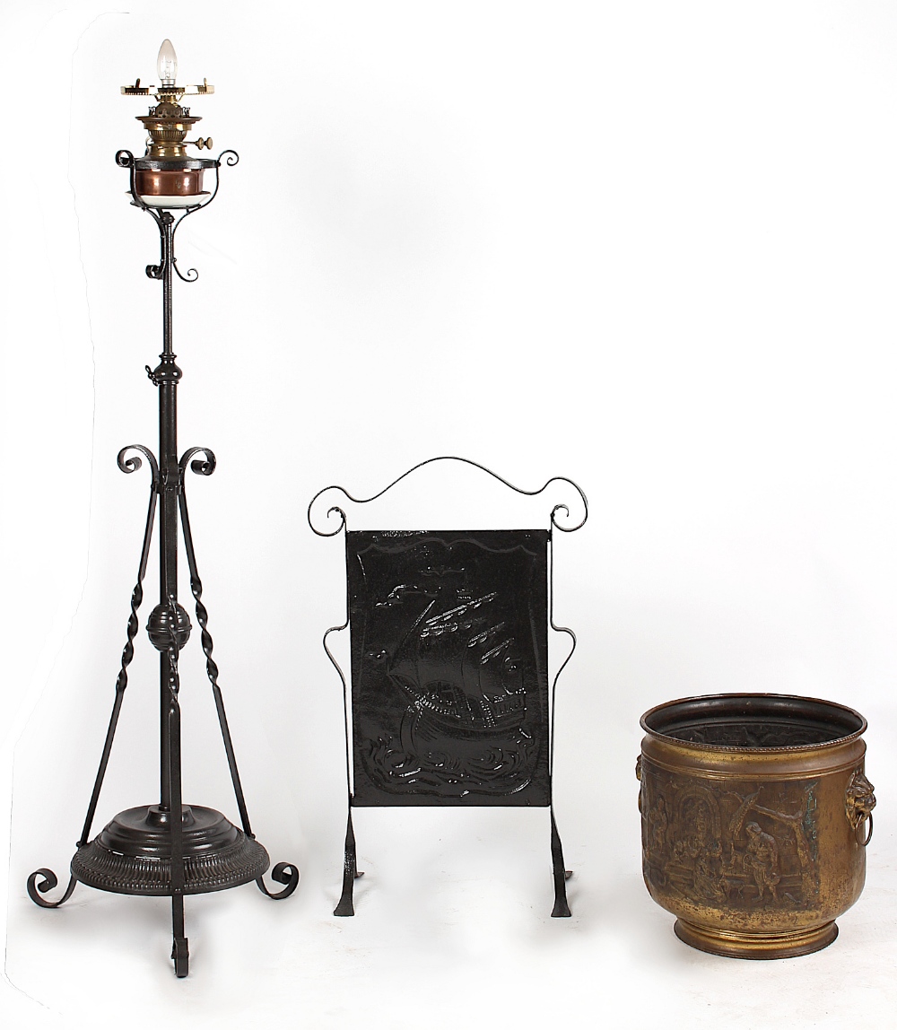 Property of a deceased estate - an early 20th century black painted wrought iron adjustable lamp