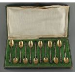 Property of a lady - a cased set of twelve French silver teaspoons, with Ypres crested finials, each