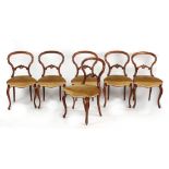 Property of a gentleman - a set of six Victorian rosewood balloon back dining chairs, with gold