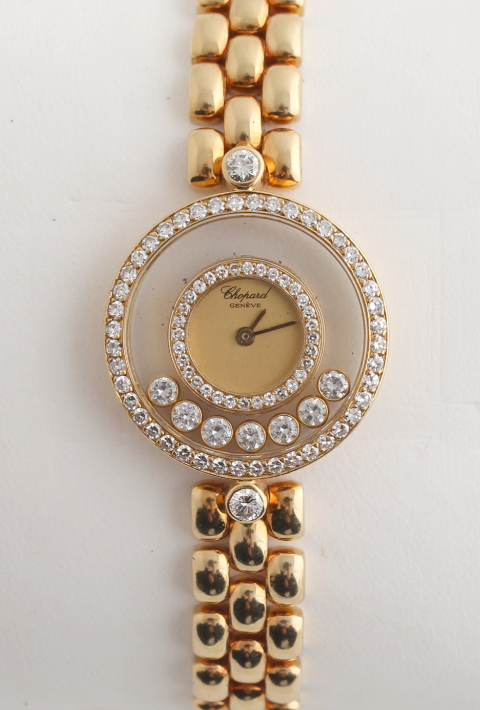 Property of a lady - a lady's Chopard 18ct yellow gold cased 'Happy Diamonds' wristwatch, in