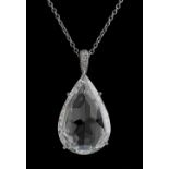 A very impressive large diamond pendant, the certificated pear shaped rose cut diamond weighing