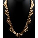 Property of a lady - a 9ct gold fringe necklace, approximately 16.5ins. (42cms.) long, approximately