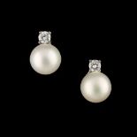 A pair of white gold pearl & diamond earrings, with post & butterfly fastenings, each with a