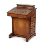 Property of a lady - a Victorian walnut & marquetry inlaid davenport (see illustration).