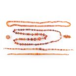Property of a lady - a quantity of amber bead necklaces & brooches (a lot) (see illustration).