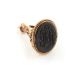 Property of a lady - a Georgian yellow metal & black basalt intaglio seal, with engraved monogram MM