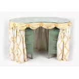 Property of a lady - a green painted kidney shaped dressing table with cream & gold drapes, 45.