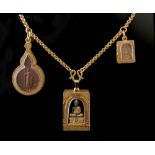 Property of a lady - a Thai yellow gold (tests 24ct) chain necklace with three charms or amulets,